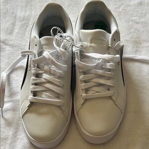 Puma White Sneakers with Black Accent